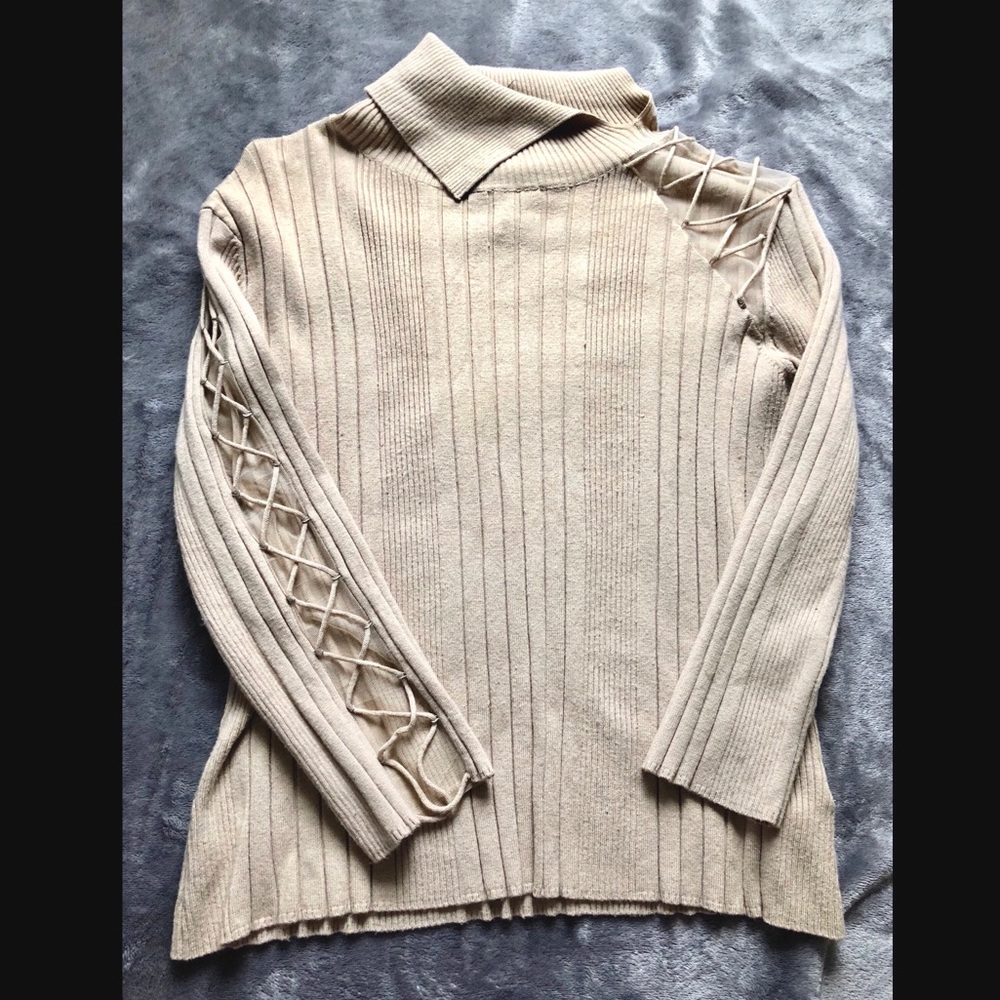 Asymmetrical turtle neck sweater